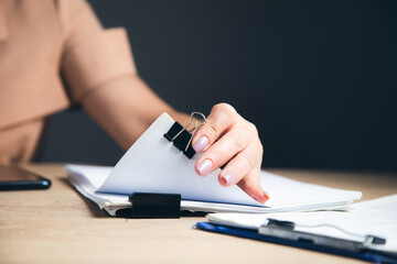 Wall Mural - woman hands working in Stacks paper files