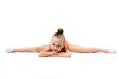 Small female gymnast lay in split down