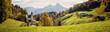 Leinwandbild Motiv Beautiful nature landscape. Incredible autumn scenery. View on Alpine highlands with Watzmann mount, colorful trees and Small church. Famous Maria Gern Church. Berchtesgaden Bavaria Alps Germany
