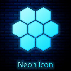 Wall Mural - Glowing neon Honeycomb icon isolated on brick wall background. Honey cells symbol. Sweet natural food. Vector