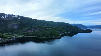 Canvas Print - Drone view of a beautiful green shore in Fauske municipality, Norway