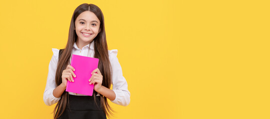 Wall Mural - happy teen girl in school uniform hold book, back to school. Banner of school girl student. Schoolgirl pupil portrait with copy space.