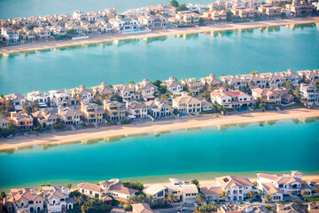 The Palm Jumeirah. Holidays villas and luxury hotels view at sunset. Dubai, UAE