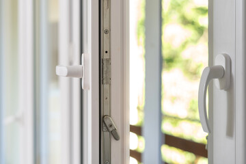 Canvas Print - opened metal door or window frame at apartment