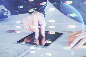 Aufkleber - Double exposure of man's hand holding and using a digital device and data theme drawing. Technology concept.