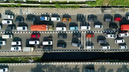 Wall Mural - Top down view of cars moving on traffic jam