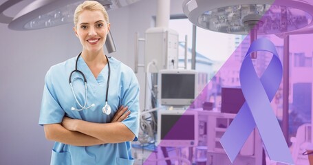 Poster - Composite image of awareness ribbon and caucasian smiling young female doctor with arms crossed