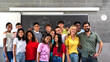 © Daniel - Multiracial teen high school students group class portrait with teacher looking at camera.