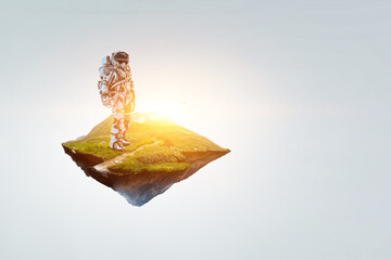 Wall Mural - spaceman on a light bulb