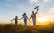 © Konstantin Yuganov - Happy family at sunset