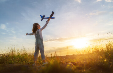 Wall Mural - Happy kid with toy plane