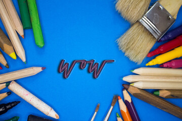 Poster - Overhead shot of school supplies with Wow text. Brushes, pencils, artistic tools. Art And Craft Work Tools.