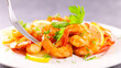 grilled shrimp with sauce and herbs