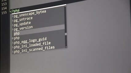 Wall Mural - typing php-code on screen by web developer and php developer shows computer screen with source code 