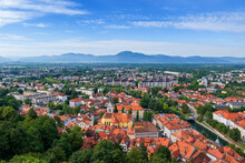 Slovenia,Ljubljana, View Of Old Town With Hills In Distant Background