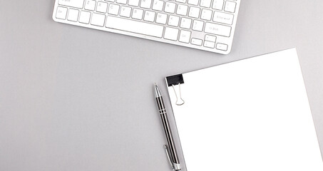 Poster - Keyboard and paper on grey background , copy space