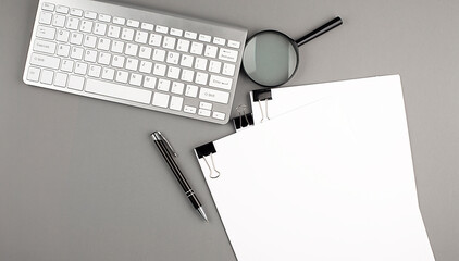 Poster - Keyboard and paper on grey background , copy space