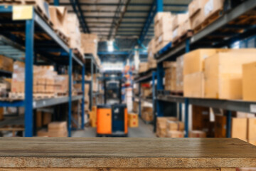 Empty top of wooden shelves on warehouse template background for product display.