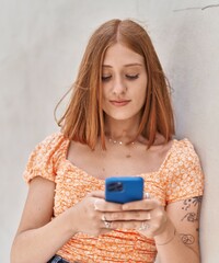 Sticker - Young redhead woman smiling confident using smartphone over white isolated background