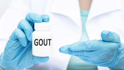 Wall Mural - Gout text on the label of a white can in the doctor's hand, a medical concept