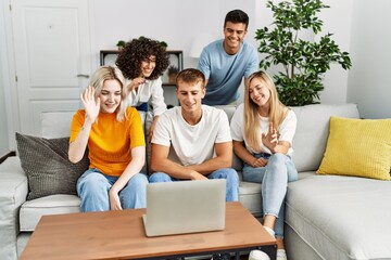 Poster - Group of young friends smiling happy having video call using laptop at home.