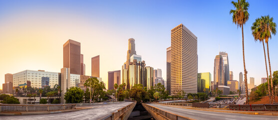 the skyline of los angeles during sunrise