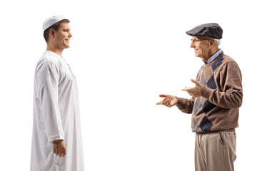 Wall Mural - Elderly man and a young man in ethnic clothes talking