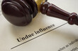 Info about undue influence and gavel near.