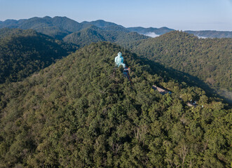 Aerial view of the mock-up Daibutsu Buddha statue in Wat Phra That Doi Phra Chan temple in Mae Tha district, Lampang province of Thailand.