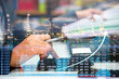 © totojang1977 - businessman using laptop computer show business growth investment stock finance profit graph of marketing financial increase digital money trade chart and success global target economy arrow diagram.