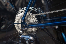 Close-up Of Rear Wheel Of Road Bike. Disc Brakes And Sprocket.