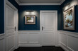 Empty hallway with elegant wooden moulding panels on the wall