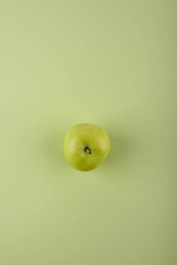 Wall Mural - Green apple grape on green background.