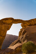 view through a rock arch in wadi rum desert, Jordan, middle east. High quality photo