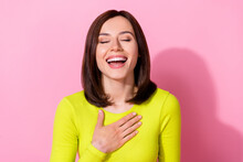 Photo Of Dreamy Funky Girl Dressed Lime Shirt Laughing Hand Arm Chest Closed Eyes Isolated Pink Color Background