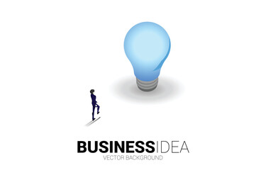 Poster - Silhouette of businessman walking to light bulb . Business Concept of creative idea and solution.