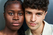 © ADDICTIVE STOCK - Multiethnic man and woman standing close