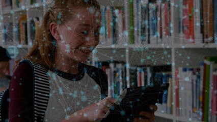 Poster - Animation of dots connecting with lines over excited caucasian girl using digital tablet in library
