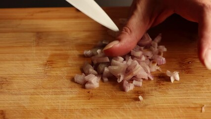 Wall Mural - cutting shallot on wooden chopping board