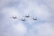 a group of military aircraft in combat formation