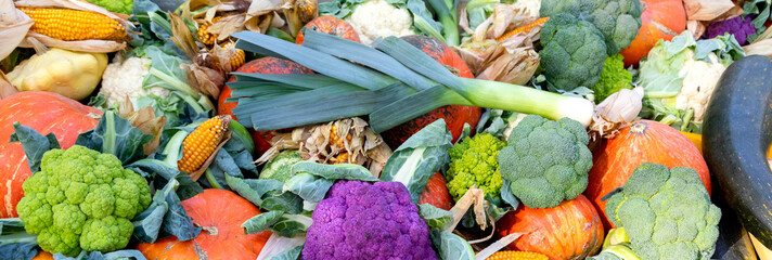 Leeks, cauliflower, corn and other vegetables on the farmers counter during the traditional seasonal fair.