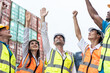 © Kawee - Group of young male and female worker working in container terminal.