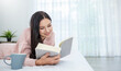 © paulaphoto - Portrait of young beautiful caucasian woman relax holding book in bedroom. Smile happy asian girl relaxing knowledge education university woman, Indian or Arab  lifestyle, back to school concept