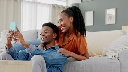 Poster - Couple phone selfie, funny communication and relax on sofa in house, comic conversation with social media on smartphone and comedy talking on web. Happy African man and woman taking photo with tech