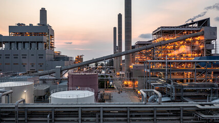 Wall Mural - Aerial view coal power plant at dusk, Coal power station chimney pipes production electricity, Coal power plant in electricity generation.