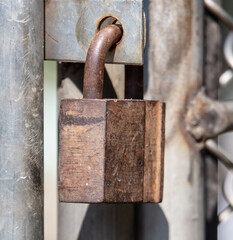 Wall Mural - Old rusty metal lock on the door.