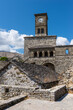 Clock Tower in Gjirokaster Citadel surrounded by ancient ruins, attraction in Albania, Europe