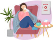 sick woman possibly with cold or flu is at home on a sofa having a cup of tea or hot drink