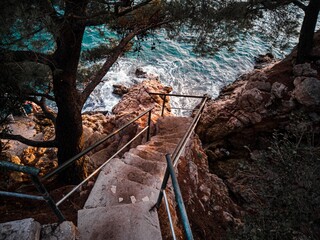 Wall Mural - Aerial top view of a stairway leading to the sea in Dubrovnik, Croatiaa