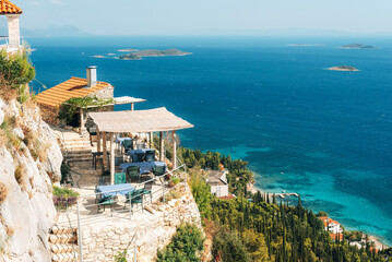 Wall Mural - Franciscan monastery on a cliff, cafe with sea view in Orebic town. Peljesac peninsula, Croatia